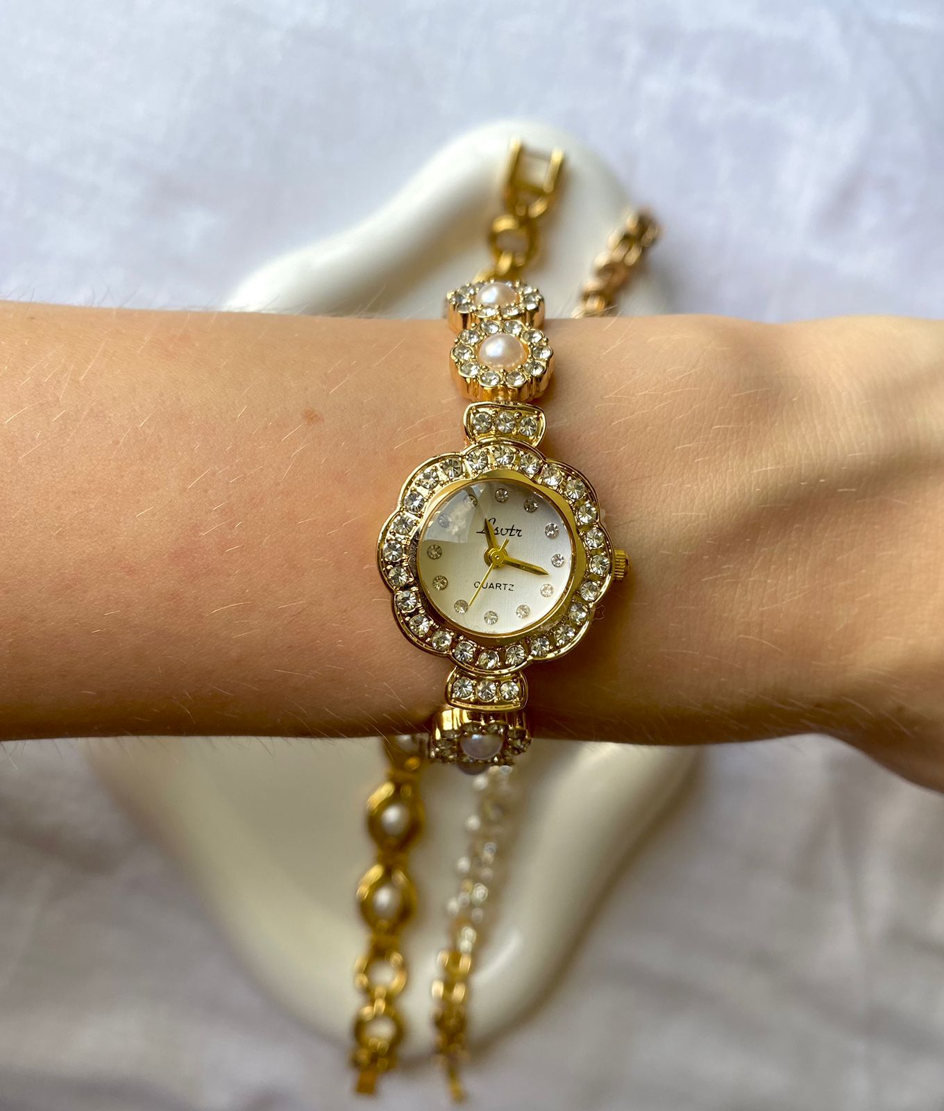 Reloj "Perla Dorada"