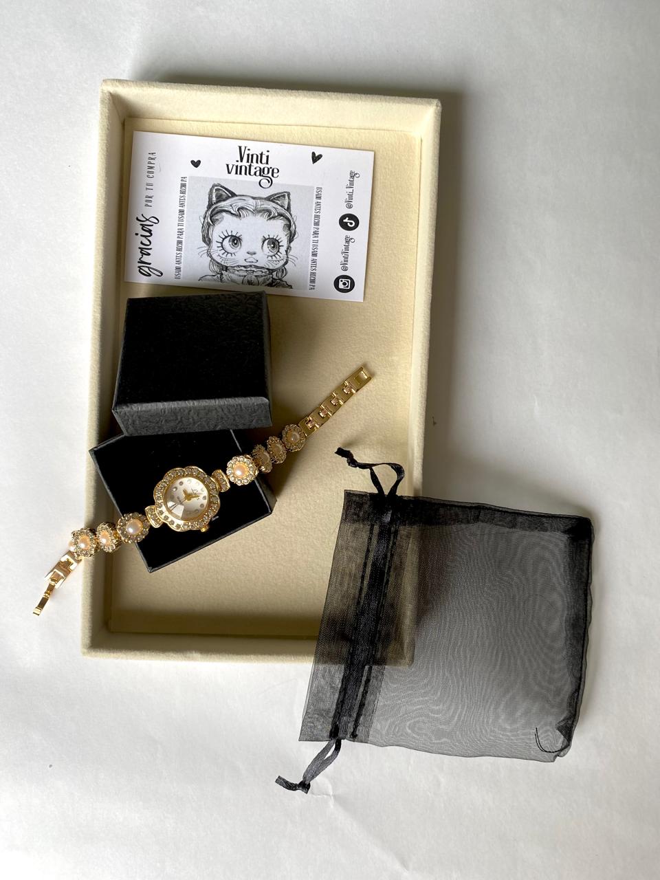Reloj "Perla Dorada"