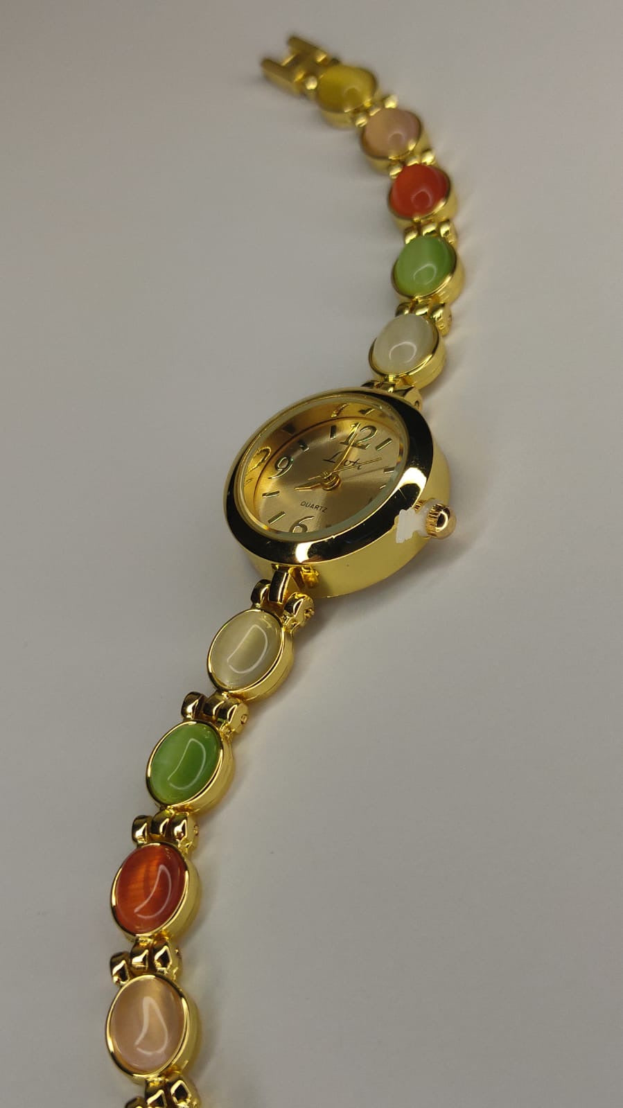 Reloj “Arcoíris vintage”