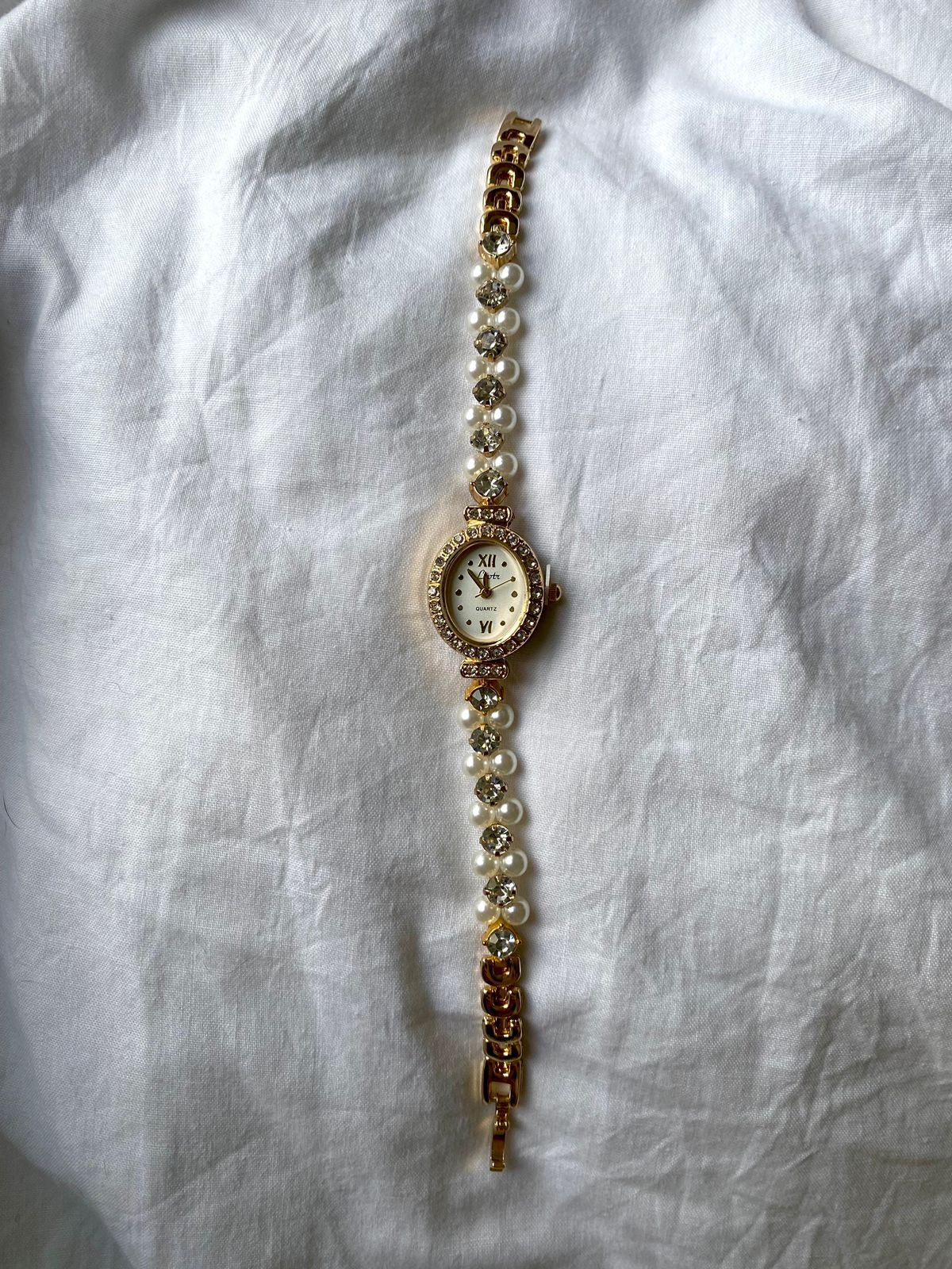 Reloj "Perlas de Medianoche"