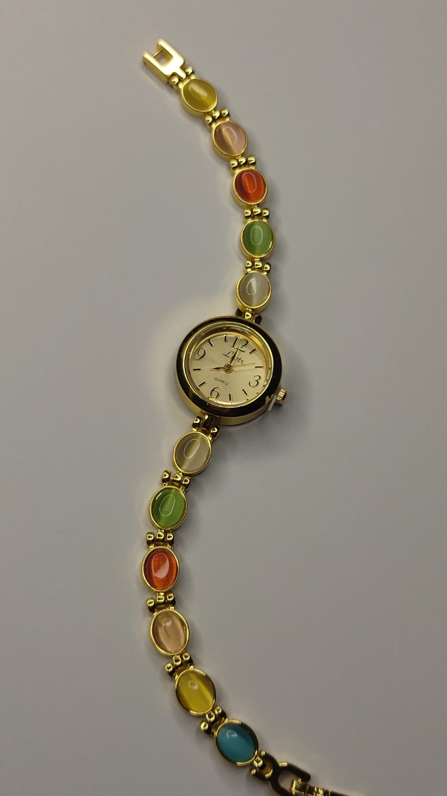 Reloj “Arcoíris vintage”