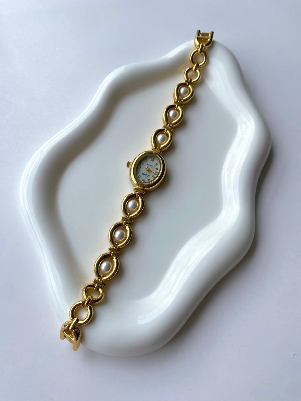 Reloj "Elegancia Oval"