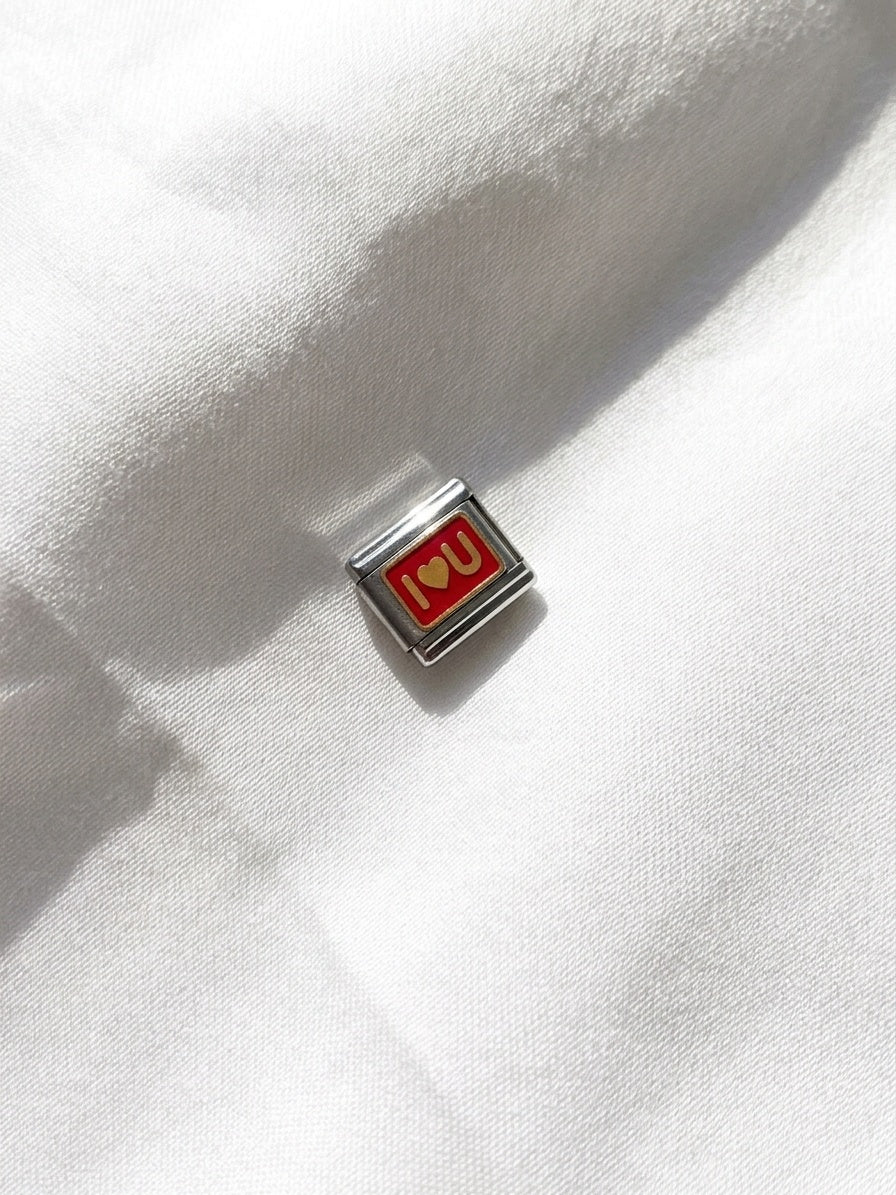 Charm con diseño: 98
