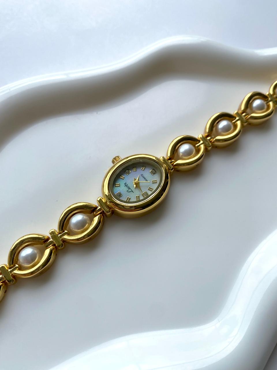 Reloj "Elegancia Oval"