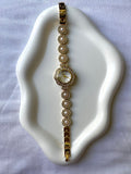 Reloj "Perla Dorada"