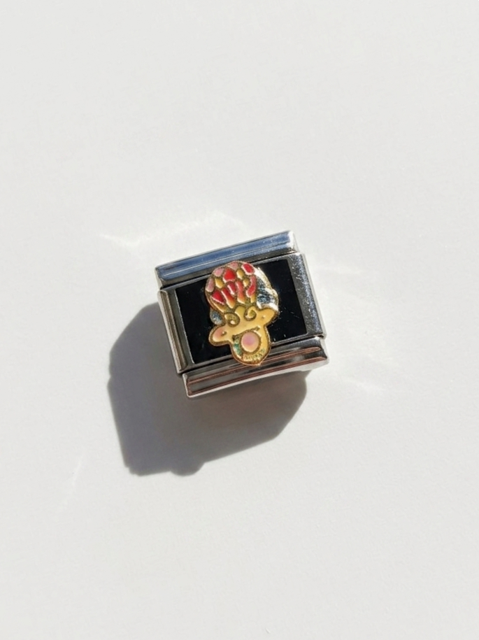 Charm con diseño: 56