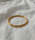 Pulsera “Caña dorada”